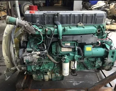 Diesel mechanic servicing engine near Dallas